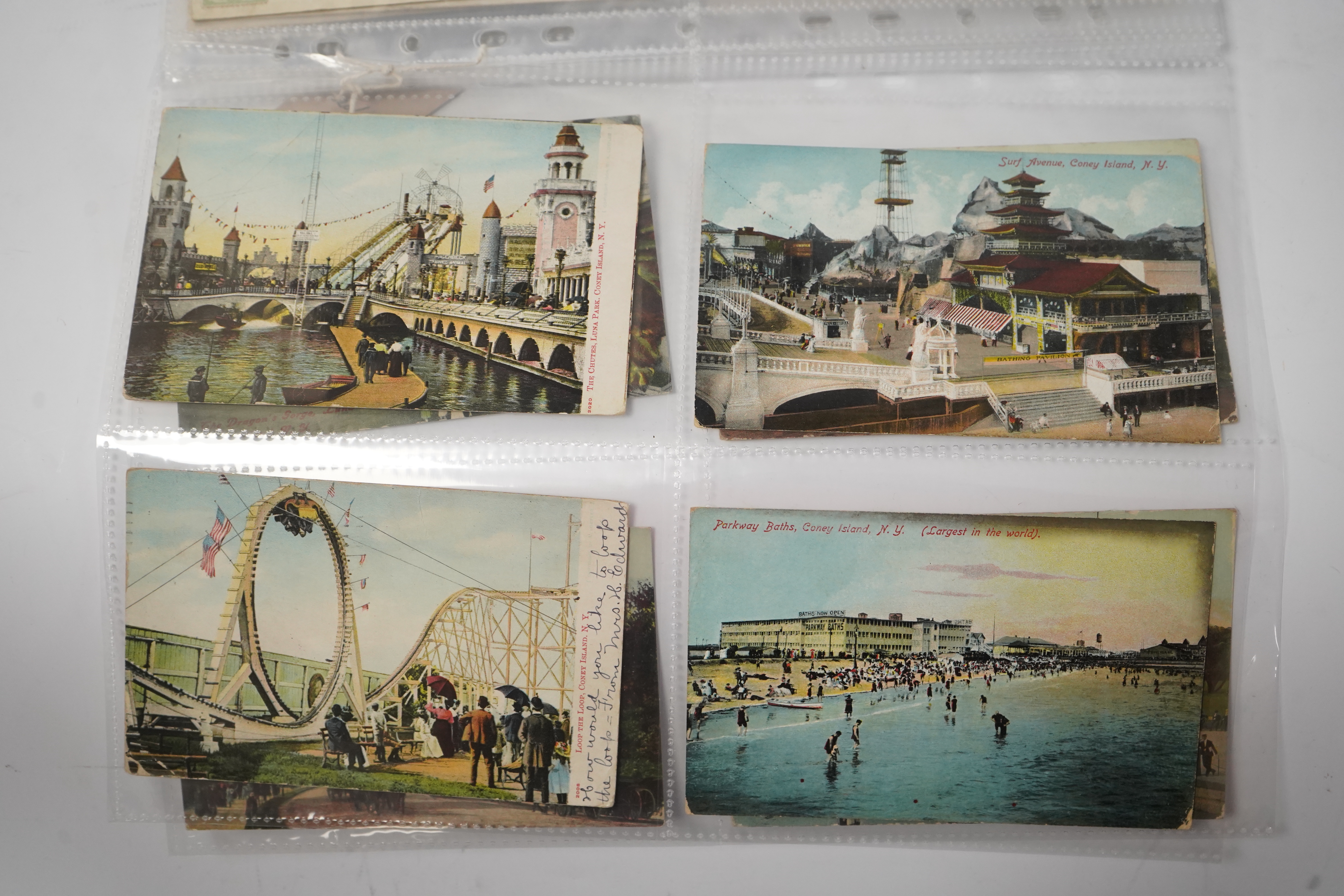 A group of eighty eight assorted vintage postcards, including American topography, rail accidents and motoring.